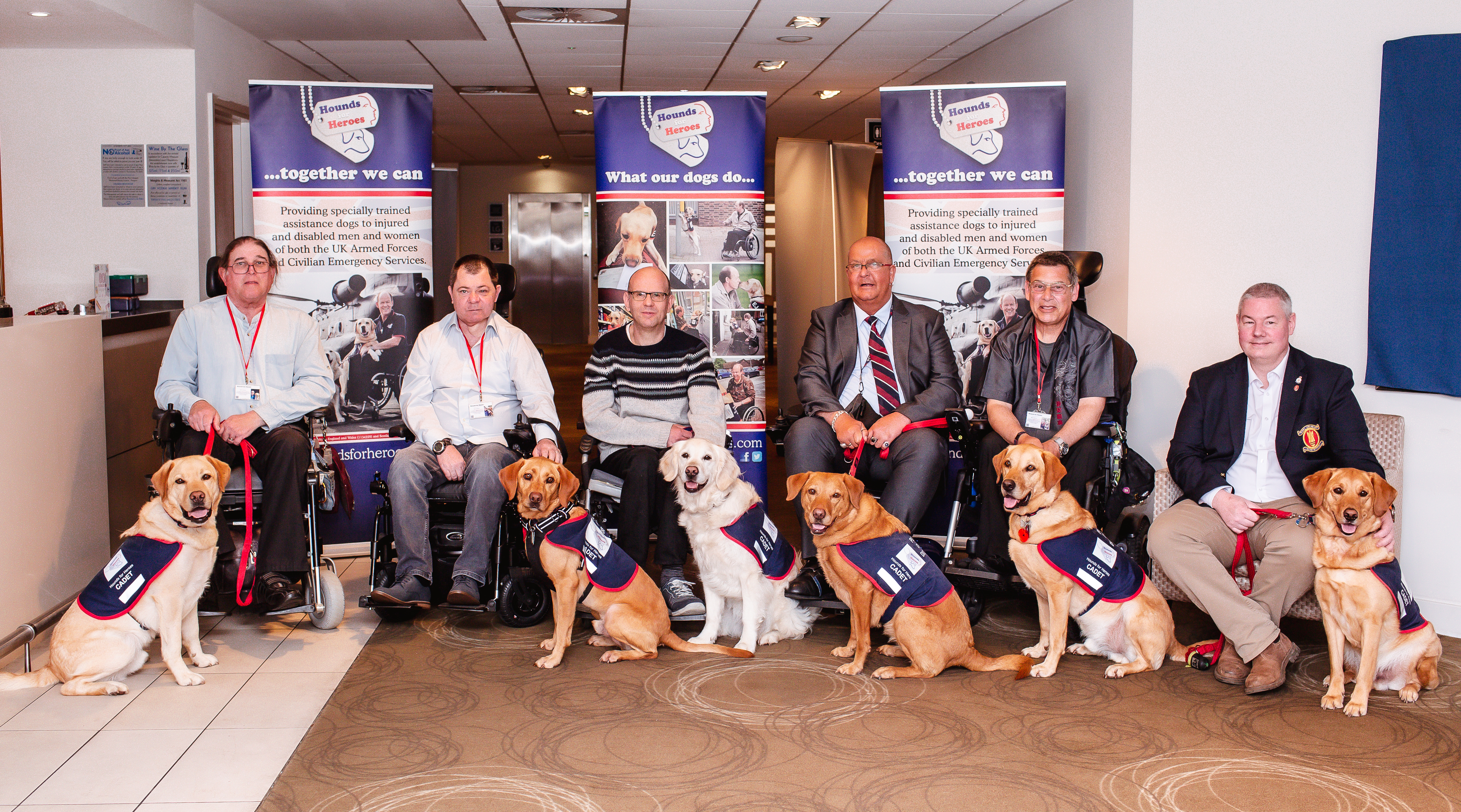 6 of our partners with their assistance dogs