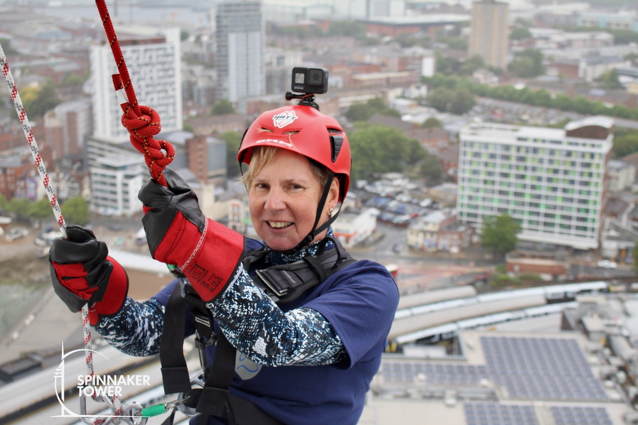 Fundraiser abseiling the Spinnaker Tower for Hounds for Heroes