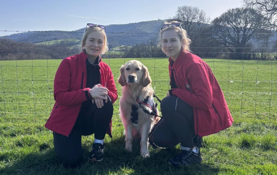 Hounds for Heroes Staff with Assistance dog showing support on International Women's day 2026