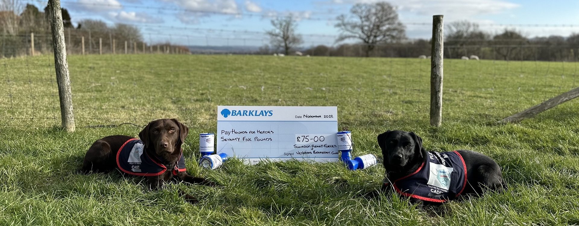 Copper and Phoebe with cheque