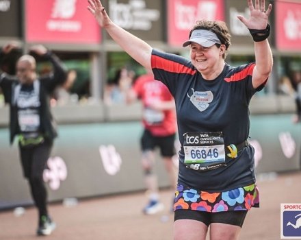 Supporter Katie crossing London Marathon finish line
