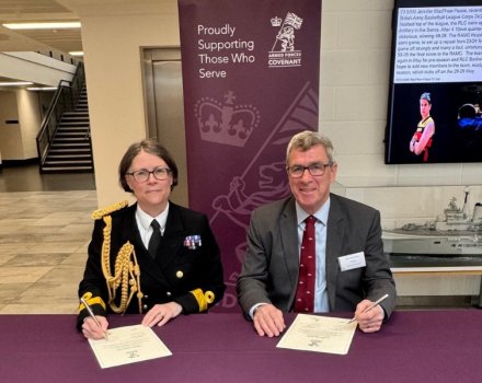 Peter signing MOD Armed Forces Covenant