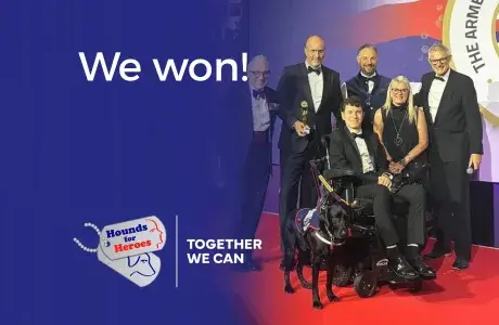 Ryan and Assistance Dog Comet with the Hounds for Heroes team after winning the Animal Partnership Award