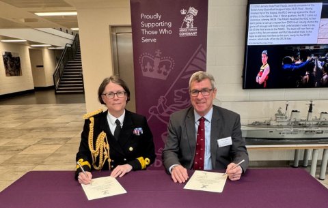 Peter signing MOD Armed Forces Covenant
