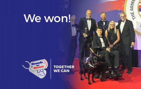 Ryan and Assistance Dog Comet with the Hounds for Heroes team after winning the Animal Partnership Award